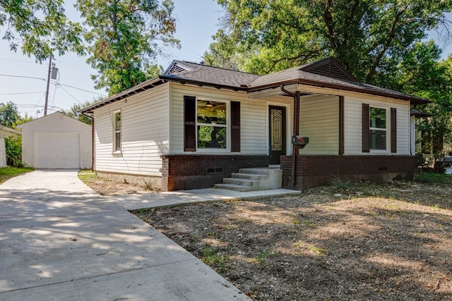 view of front facade with an outdoor structure and a garage