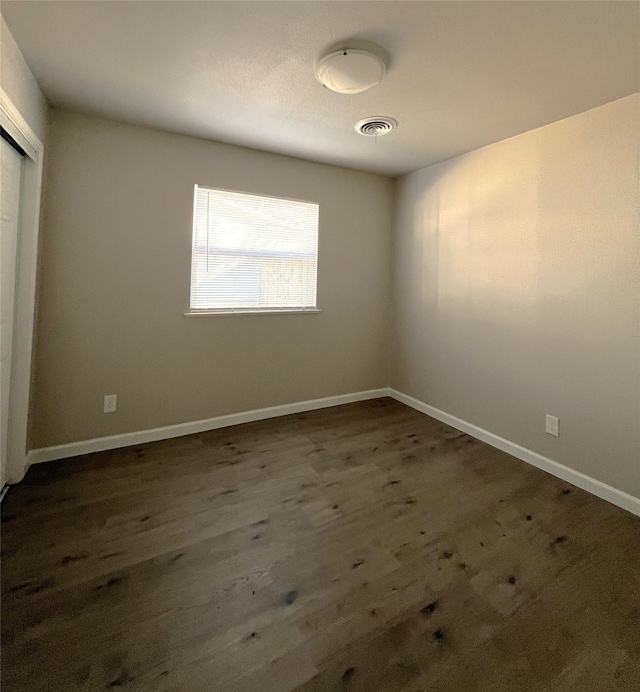 interior space with dark hardwood / wood-style floors