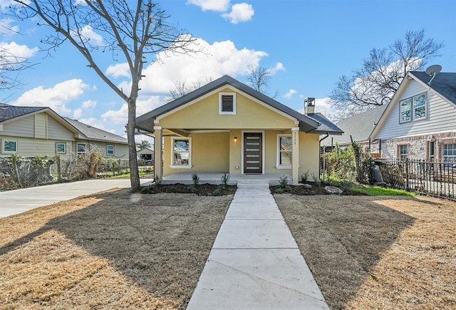 bungalow-style home featuring covered porch