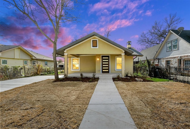 bungalow-style home with covered porch