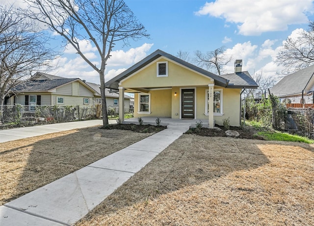 bungalow-style home featuring covered porch