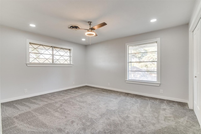 carpeted empty room with ceiling fan