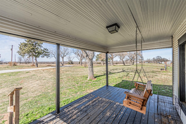 wooden deck with a lawn