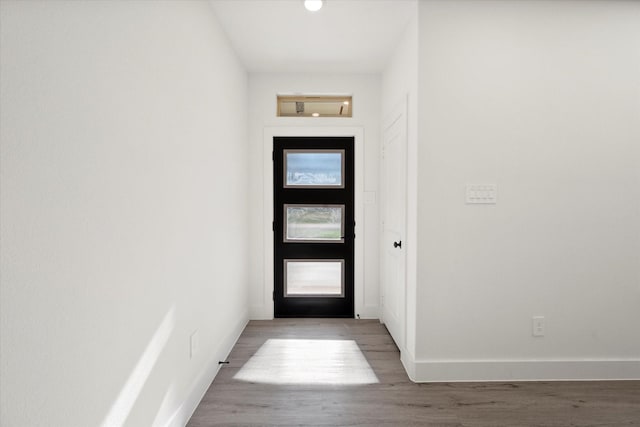 entryway with light hardwood / wood-style floors