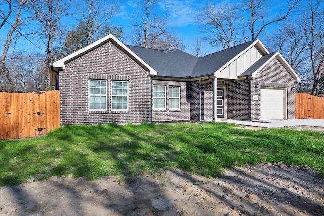 ranch-style house with a garage and a front lawn