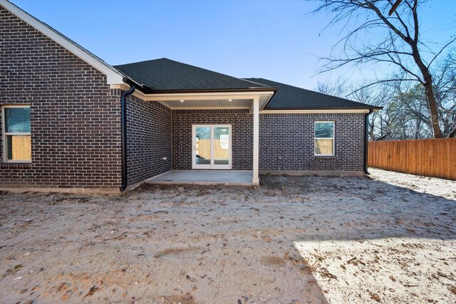 rear view of house featuring a patio