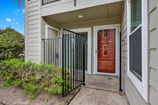 property entrance with a balcony