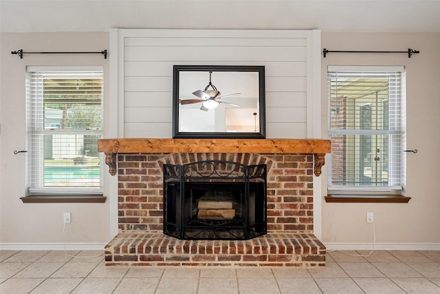 details with ceiling fan and a fireplace