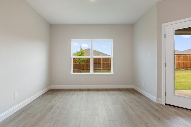 209 Briarwood Dr, Nevada, TX 75173 - unfurnished room with light wood-style floors and baseboards