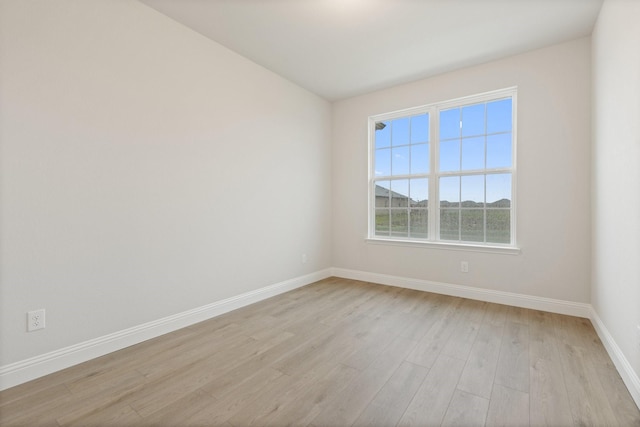 209 Briarwood Dr, Nevada, TX 75173 - spare room featuring baseboards and light wood-style floors