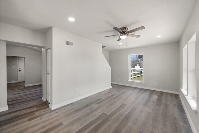 unfurnished room with ceiling fan and wood-type flooring