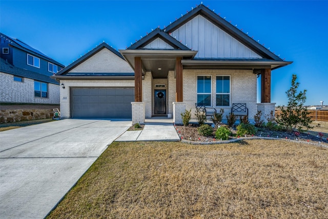 craftsman house with a garage