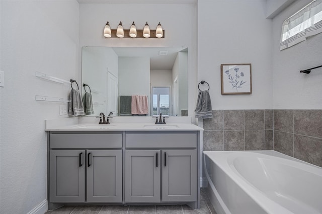 bathroom with a bathing tub and vanity