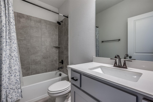 full bathroom with shower / bath combination with curtain, toilet, and vanity