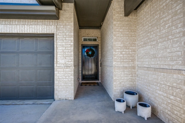 entrance to property with a garage