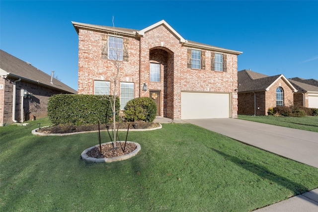 view of front facade featuring a garage and a front yard