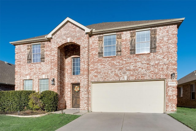 view of front of property featuring a garage