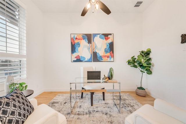 office featuring ceiling fan and light hardwood / wood-style floors