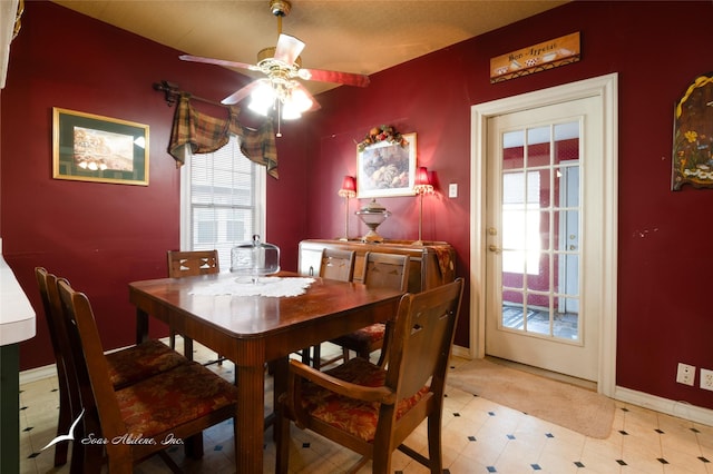 dining space with ceiling fan