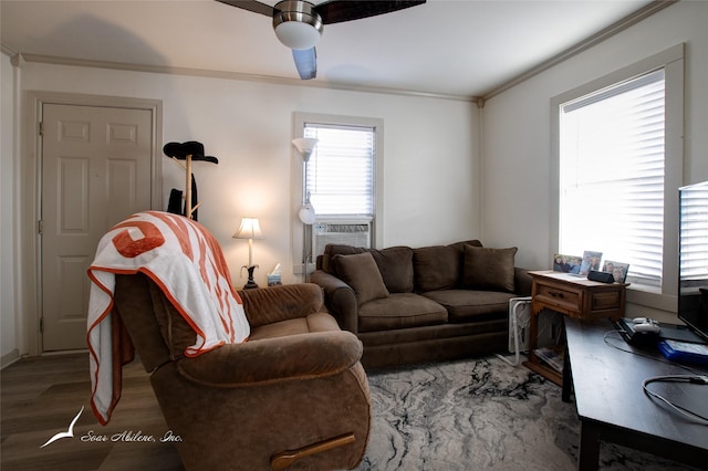 living room featuring ceiling fan, cooling unit, wood-type flooring, and ornamental molding