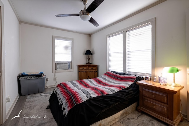 bedroom with ceiling fan, cooling unit, and ornamental molding