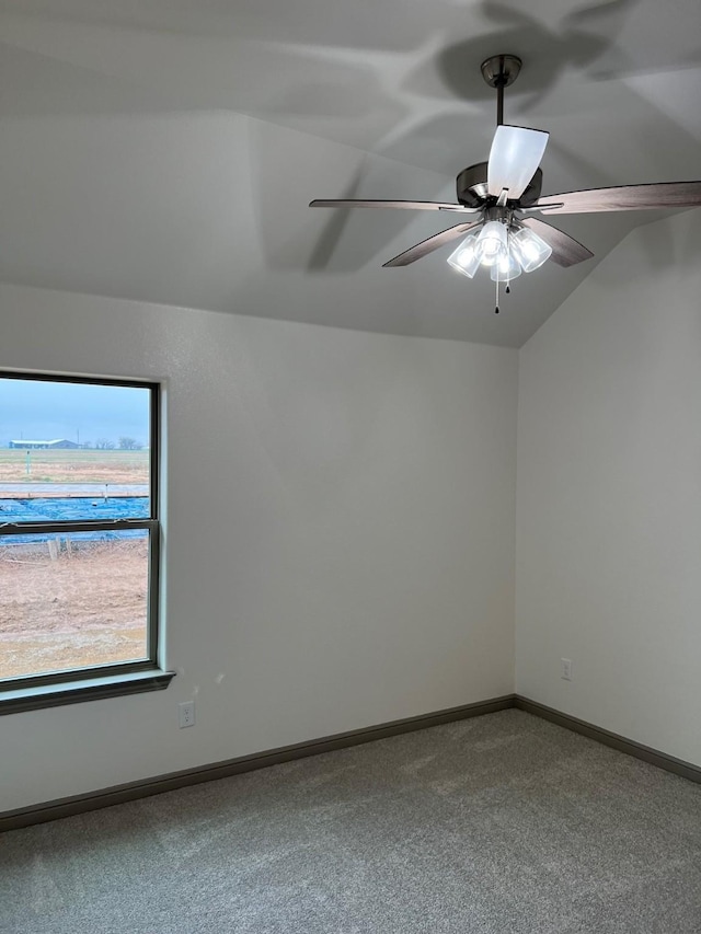 unfurnished room with carpet floors, ceiling fan, and lofted ceiling