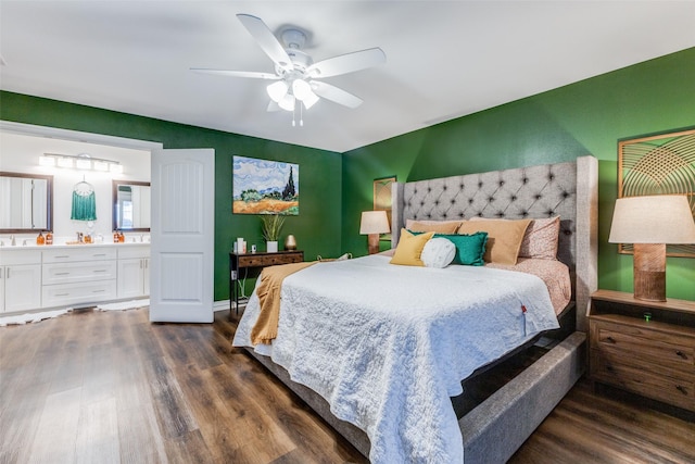 bedroom with dark hardwood / wood-style floors, ceiling fan, and ensuite bathroom