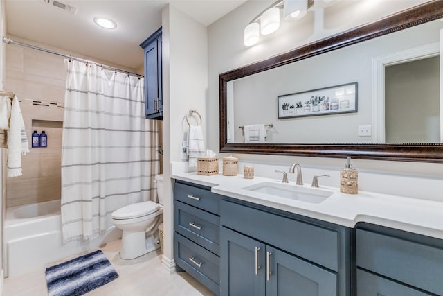 full bathroom with shower / bath combination with curtain, vanity, and toilet