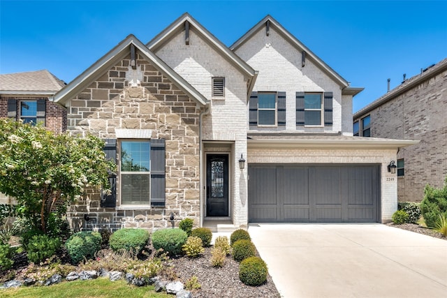 view of front of home with a garage