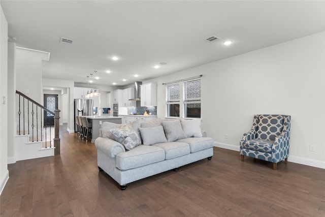 living room with dark wood-type flooring