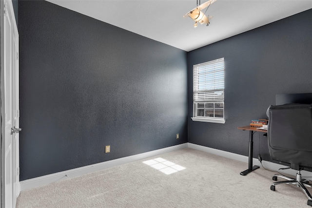 view of carpeted office space