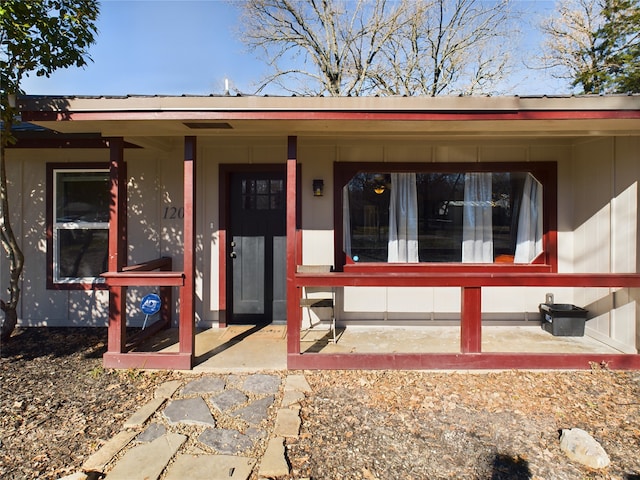 entrance to property with covered porch