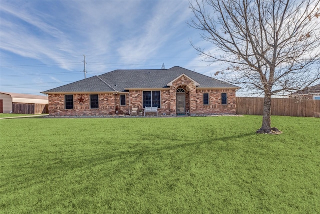 ranch-style house with a front yard