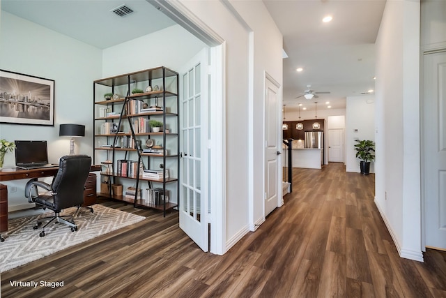 office area featuring ceiling fan and dark hardwood / wood-style floors