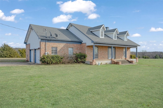 cape cod house with a garage, covered porch, and a front lawn