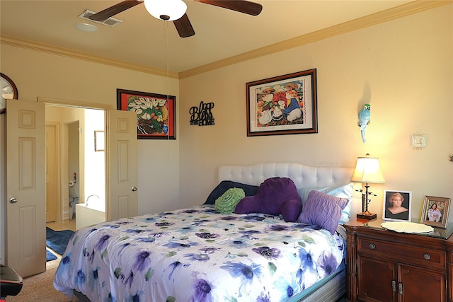 carpeted bedroom featuring ornamental molding and ceiling fan