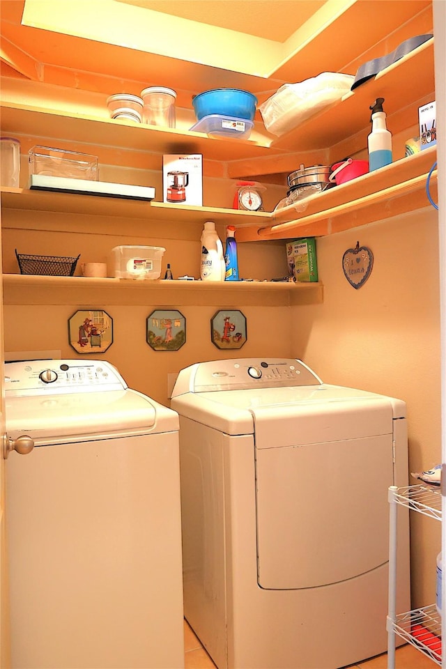 laundry room with washer and dryer