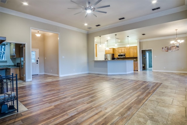 unfurnished living room featuring light wood-type flooring, ceiling fan with notable chandelier, and crown molding