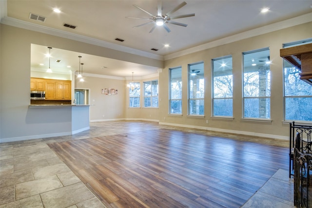 unfurnished living room featuring crown molding, ceiling fan with notable chandelier, and light wood-type flooring