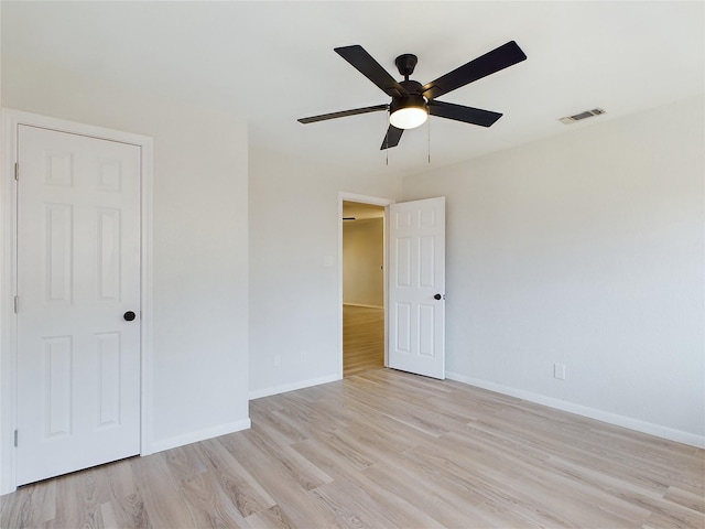 unfurnished bedroom with light hardwood / wood-style floors and ceiling fan