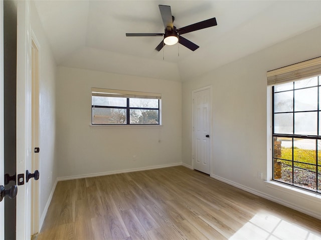 empty room featuring ceiling fan and light hardwood / wood-style floors