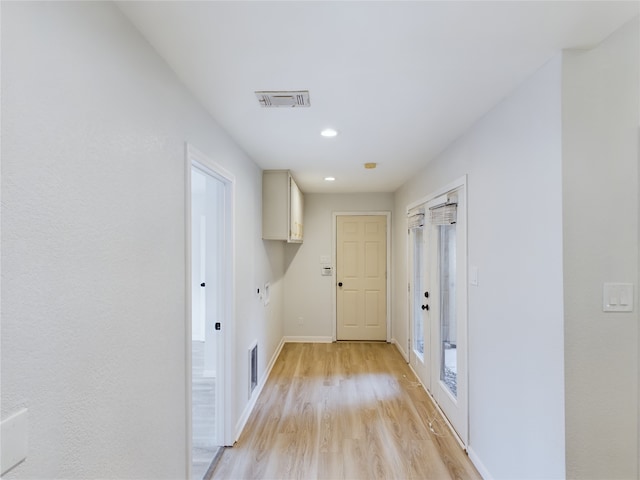 hall featuring light hardwood / wood-style flooring