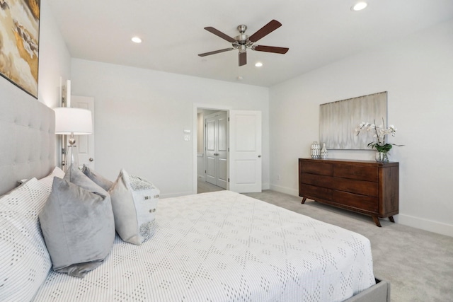 carpeted bedroom featuring ceiling fan