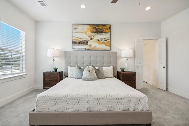 carpeted bedroom featuring ceiling fan