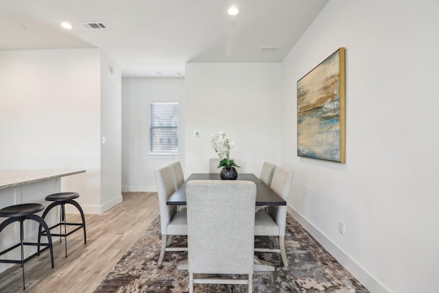 dining room featuring light wood-type flooring