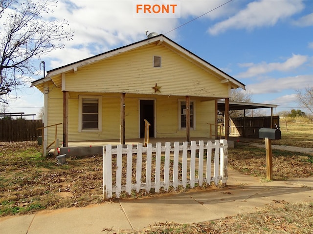 view of front of home featuring covered porch