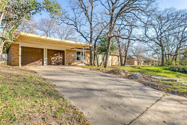 view of front of home with a carport