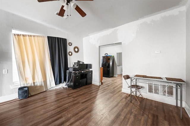 interior space with hardwood / wood-style flooring and ceiling fan