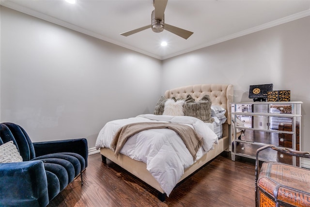 bedroom with ceiling fan, crown molding, and dark wood-type flooring