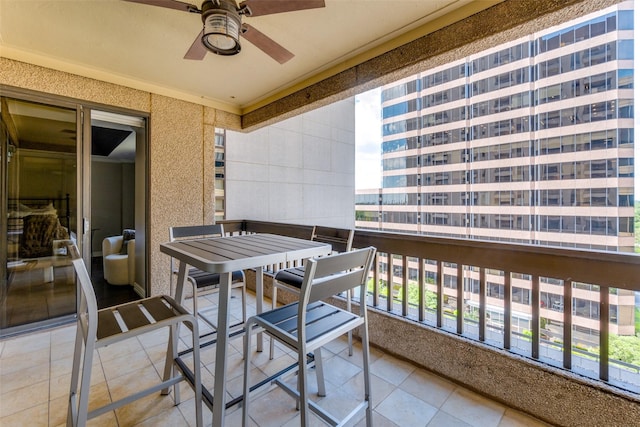 balcony featuring ceiling fan